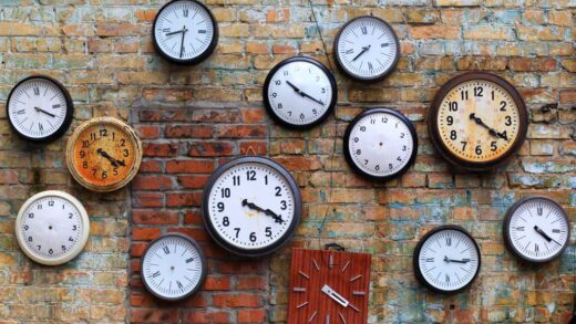 shutterstock 435558448 old clocks on brick wall time, time change, timeless