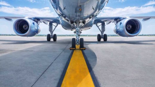 shutterstock 637037008 underside of jet aircraft and jet turbines on runway