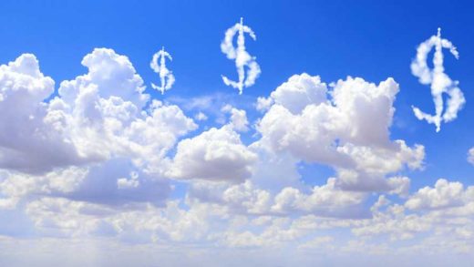 Cloud costs. US dollar signs floating above clouds in the sky.