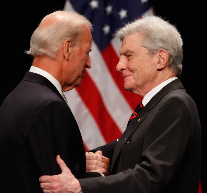 Joe biden greeting colleague