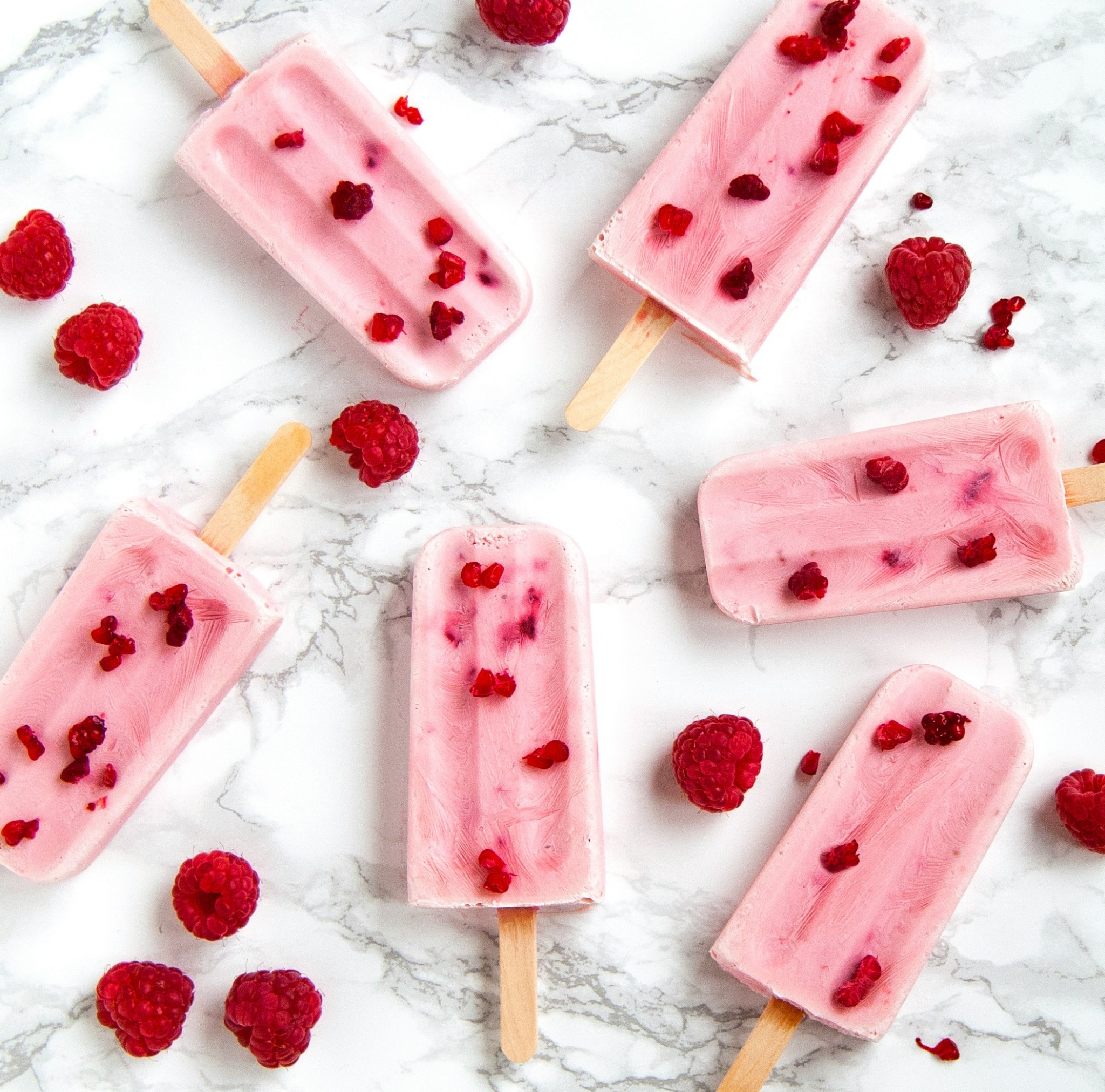 Raspberry popsicles flat lay