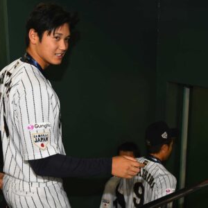 Shohei ohtani smiling dugout