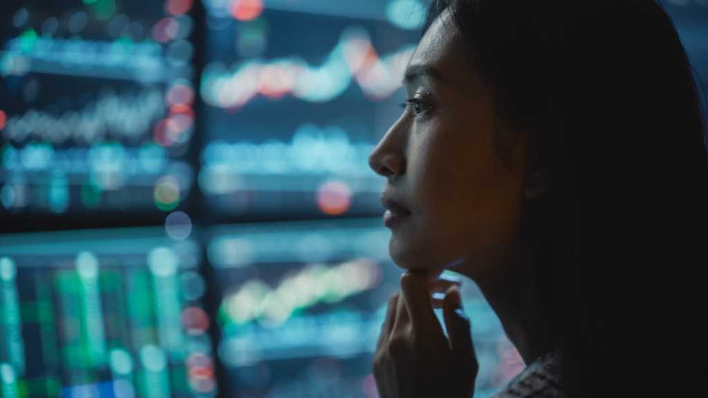 woman contemplating analytics