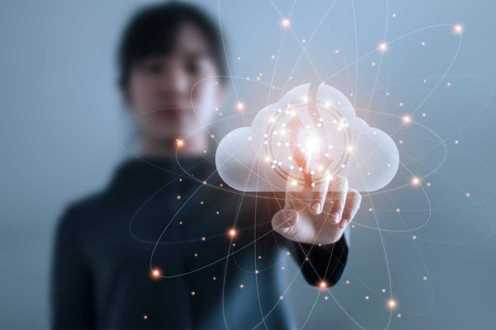 Business woman touching connect to data information on cloud computing network. Cloud computing concept.