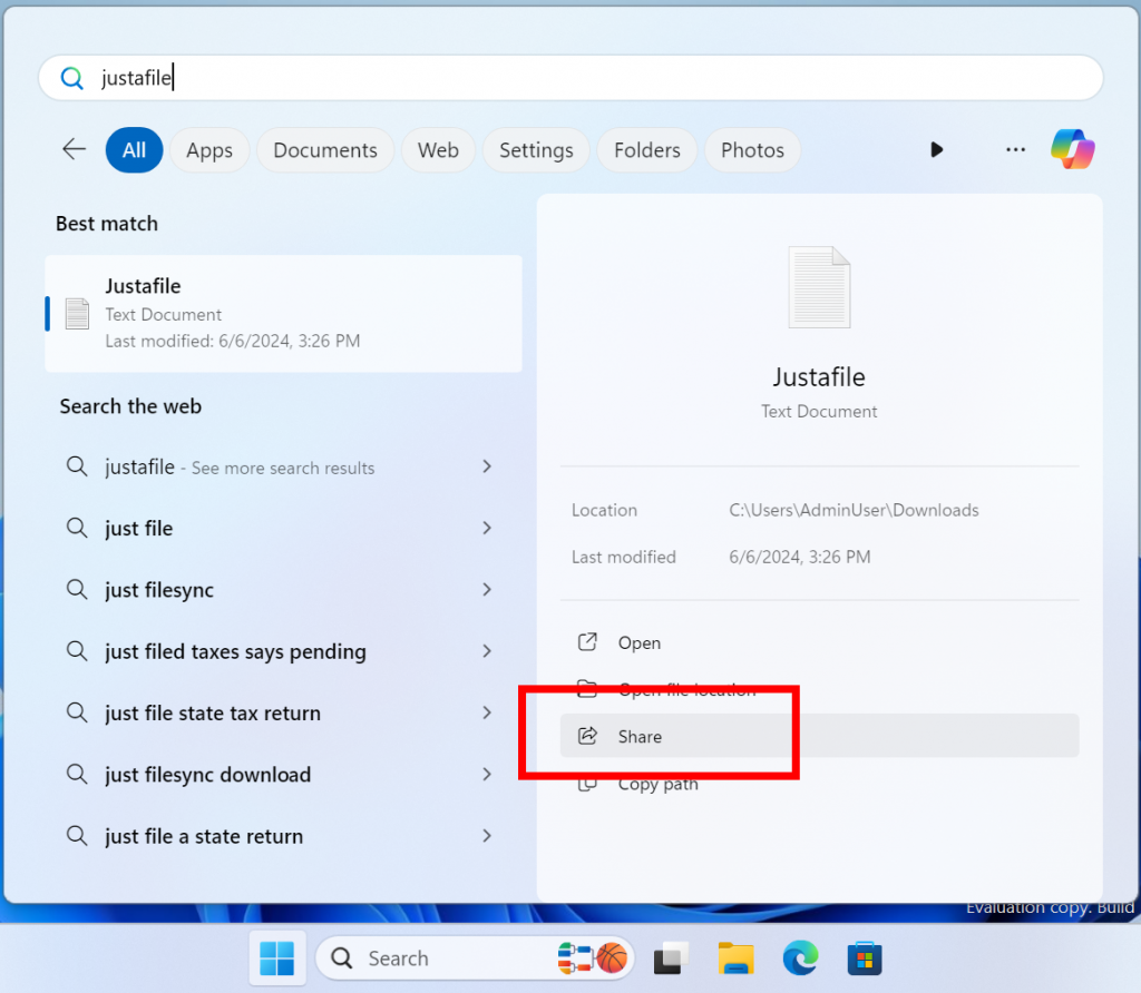 New option to share a local file highlighted in a red box in the search results from the search box on the taskbar.