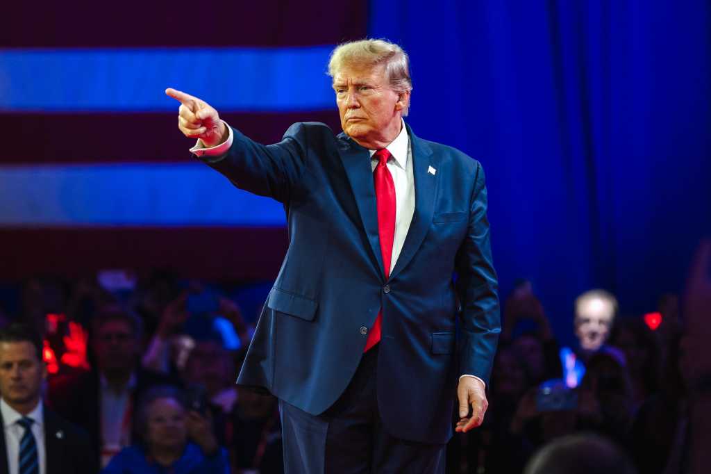 NATIONAL HARBOR, MD, USA- February 24, 2024: Donald Trump speaks at CPAC about his plan for defeating current President Joe Biden in November.