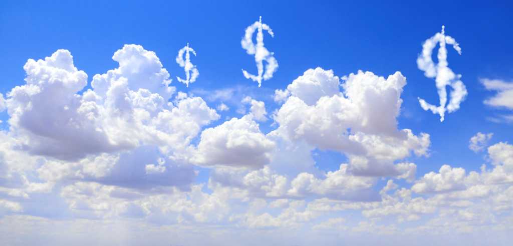 Cloud costs. US dollar signs floating above clouds in the sky. 2166686133